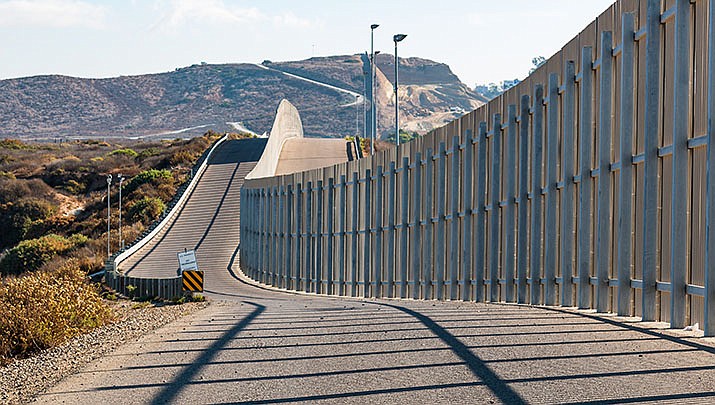 The Biden administration on Thursday agreed to pause plans for a double border wall that critics say would effectively destroy a 51-year-old oceanfront park that symbolizes friendship between the United States and Mexico. (Adobe image)