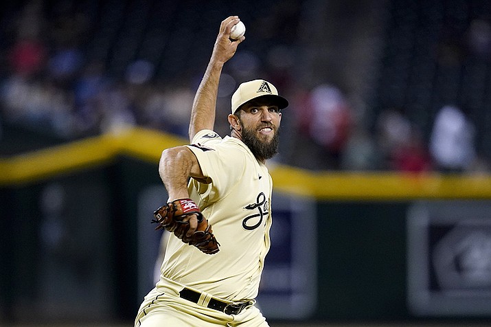 Arizona Diamondbacks starting pitcher Madison Bumgarner throws against the Colorado Rockies during the first inning Friday, Aug. 5, 2022, in Phoenix. (Ross D. Franklin/AP)