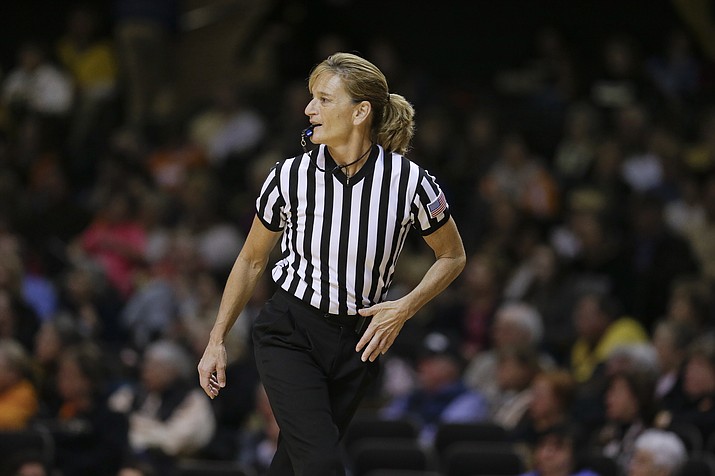 Referee Dee Kantner works in the second half of a game between Tennessee and Vanderbilt Monday, Jan. 5, 2015, in Nashville, Tenn. Kantner, a veteran referee of women’s games who works for multiple conferences, finds it frustrating to have to justify equal pay. “If I buy an airline ticket and tell them I’m doing a women’s basketball game they aren’t going to charge me less,” she said. (Mark Humphrey/AP, file)