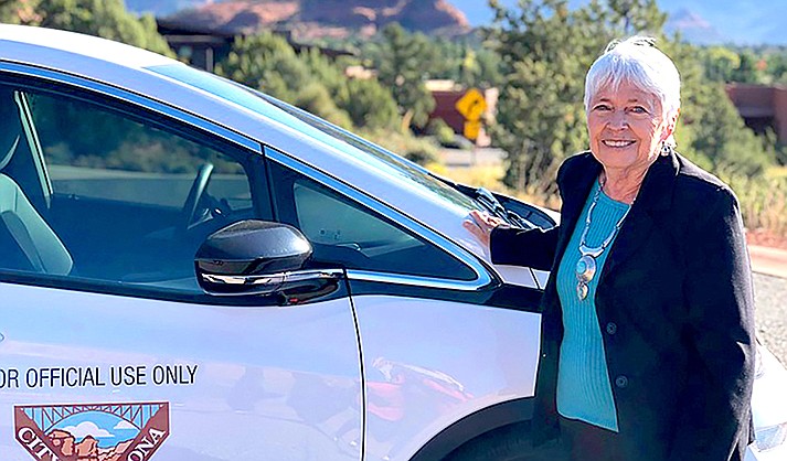 Mayor Sandy Moriarty is photographed with the city’s first electric car fleet.. (City of Sedona photo)