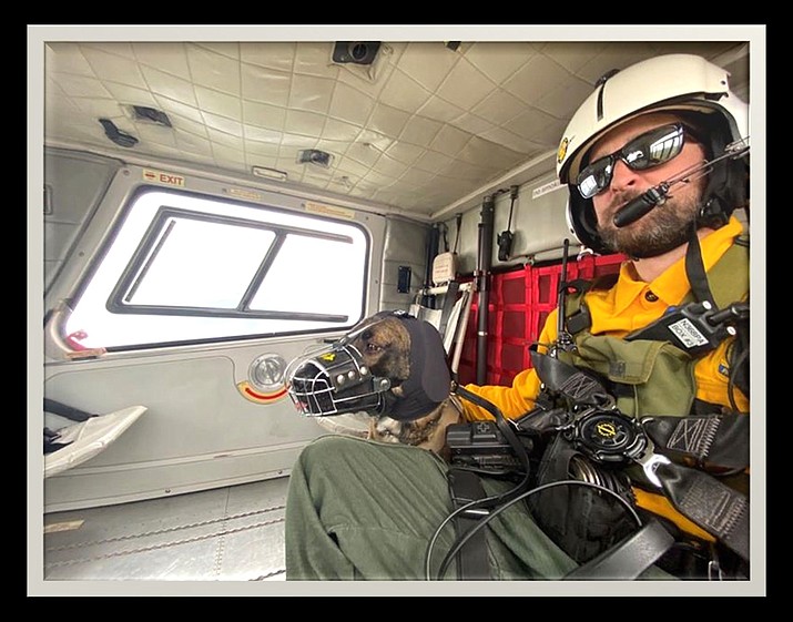 Grand Canyon Ranger Hearns and K9 Mazi complete a helicopter training mission. This was Mazi’s first exposure to helicopter operations. (Photo/NPS)