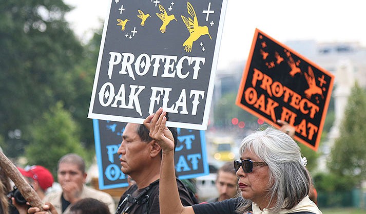 Protests against the Resolution Copper mine near Oak Flat have been going for years, as shown in this 2015 file photo from a rally at the Capitol. Opponents say the mine will harm the environment and sacred sites, supporters say those issues have been dealt with and the mine will bring jobs and economic development. Few expect the fight to end soon. (File photo by Jamie Cochran/Cronkite News)