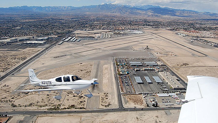 Two single-engine aircraft banked from opposite directions toward the same runway at North Las Vegas Airport last month before crashing and killing all four people aboard. An aerial photo of the airport is shown. (Photo by Eddie Maloney, cc-by-sa-2.0, https://bit.ly/3dmO2zW)