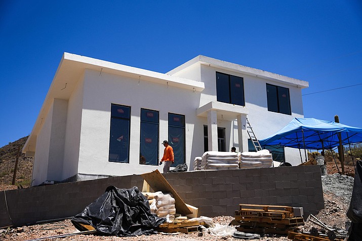 Kenneth Skinner’s house sits on a hillside in north Phoenix on July 1, 2022. The home is constructed with expanded polystyrene foam and Sabscrete, a concrete mix developed by Strata International Group. (Troy Hill/Cronkite News)
