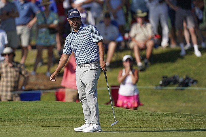 J.J. Spaun watches his putt on the 18th green during the third round of the St. Jude Championship golf tournament, Saturday, Aug. 13, 2022, in Memphis, Tenn. (Mark Humphrey/AP)