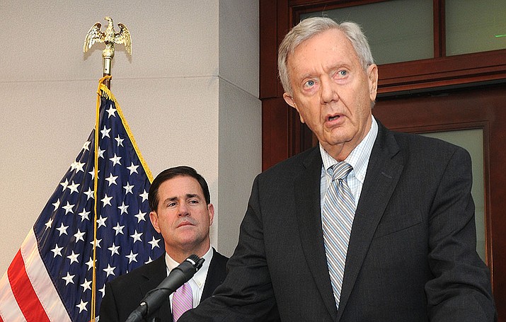Former Arizona Gov. Bruce Babbitt, shown here in 2019 with Gov. Doug Ducey, told a meeting of the Citizens Water Advisory Group Saturday the although Prescott “has the best water-conservation program in Arizona. Period,” a water crisis could be looming. (Howard Fischer/Capital News Service file photo)