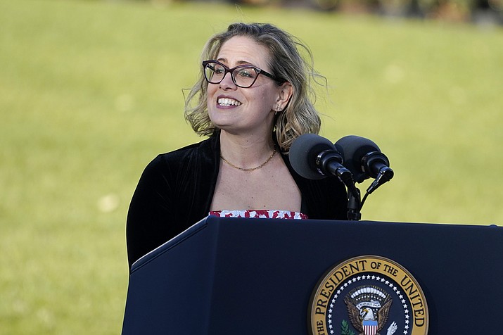 Sen. Kyrsten Sinema, D-Ariz., speaks before President Joe Biden signs the $1.2 trillion bipartisan infrastructure bill into law during a ceremony on the South Lawn of the White House in Washington, Nov. 15, 2021. Sinema received a $1 million surge of campaign cash over the past year from private equity professionals, hedge funds and venture capitalists whose interests she has staunchly defended in Congress. That's according to an Associated Press review of campaign finance disclosures.(Evan Vucci/AP, File)