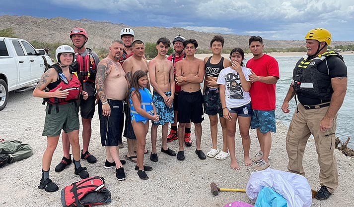 Four members of the Jerome Fire Department’s swift-water rescue team traveled to the Colorado River in Laughlin, Nevada, to train and ended up rescuing seven people and their blow-up unicorn and elephant stranded on an isolated island. (Photo courtesy of Jerome Police Department)