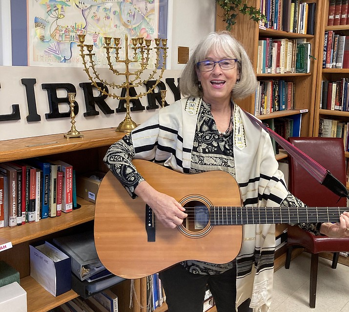 Temple B’rith Shalom has welcomed Rabbi Susan Schanerman from the Phoenix Valley as their new spiritual leader. A longtime cantorial soloist, Rabbi Schanerman counts music as a key piece of her Jewish ministry and education. Here she performs a short medley in the temple library. (Nanci Hutson/Courier)