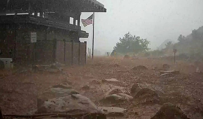 In this photo provided by the National Park Service is the scene of a flash flood in Zion National Park, Utah, on June 29, 2021. Authorities have been searching for days for Jetal Agnihotri, 29, of Tucson, Ariz., reported missing after being swept away by floodwaters in the park as strong seasonal rain storms hit parts of the U.S. Southwest. (National Park Service via AP, File)