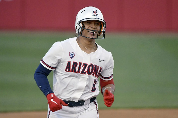 Arizona baserunner Dejah Mulipola (8) rounds the basses after hitting a home run against Arkansas during an NCAA college softball game in Fayetteville, Ark., Friday, May 28, 2021. Mulipola is the 2022 Athletes Unlimited softball champion. The former University of Arizona star scored 1,782 points to become the individual champion in a 60-player field. The winner was determined during a 30-game slate of contests all played at Parkway Bank Sports Complex in Rosemont, Illinois. (Michael Woods/AP, File)