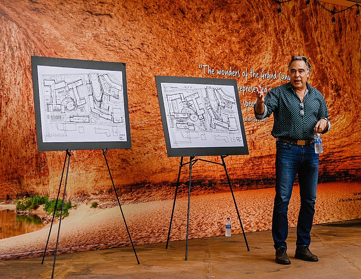 Ebbie K. Nakhjavani, president and CEO of EKN Development out of Newport Beach, California, shares a site plan for a proposed development on the northeast side of Tusayan during a community meeting Aug. 16 at the IMAX Theater in Tusayan. (Photo courtesy of Terri Attridge)