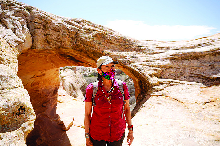 U.S. Interior Secretary Deb Haaland tours near ancient dwellings along the Butler Wash trail during a visit to Bears Ears National Monument near Blanding, Utah, April 8, 2021. (AP Photo/Rick Bowmer)