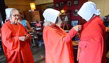 Babe Gerstner, left, and her Handmaids group, attended the Verde Valley Yavapai Democrats monthly meeting on Thursday, Sept, 1, and will be seen around area events, according to the organizer. VVN/Vyto Starinskas