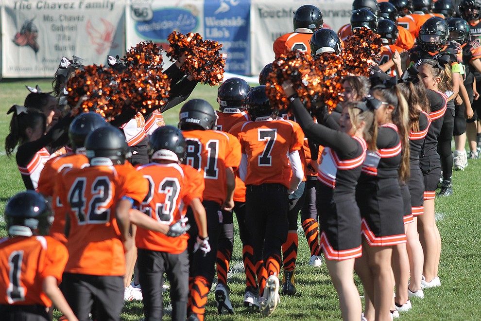 WEMS Falcons Cheerleaders create a tunnel to celebrate their win (Photo/Abbigaile Urioste)