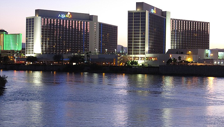Tucson, Goodyear and Scottsdale officials, who are dependent on Colorado River water via the Central Arizona project canal to supply their cities, are worried about the potential for additional cuts to Arizona’s river water quota. The river is pictured in a photo taken from Bullhead City looking across the river to casino row in Laughlin, Nevada. (Photo by Ken Lund, cc-by-sa-2.0, https://bit.ly/2KzPxv0)