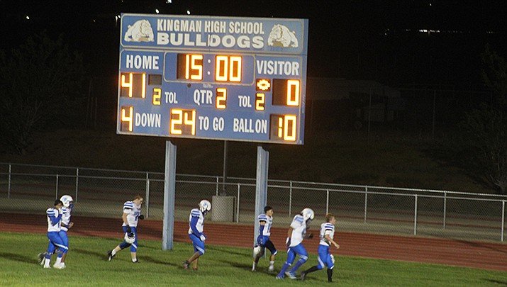 The scoreboard after the first half says it all. Kingman Academy, which plays its home games at Kingman High School, jumped out to an insurmountable 41-0 lead over Catalina on Thursday, Sept. 15. The Tigers went on to win 54-0. (Photo by Casey Jones/Kingman Miner)
