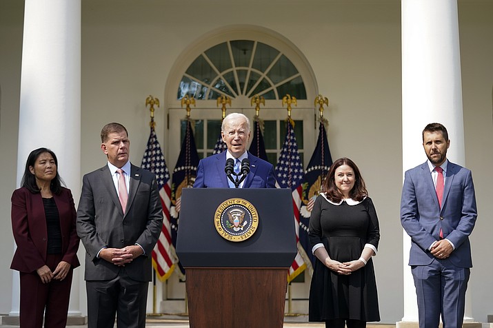 President Joe Biden speaks about a tentative railway labor agreement in the Rose Garden of the White House, Thursday, Sept. 15, 2022, in Washington. From left, Deputy Secretary of Labor Julie Su, Secretary of Labor Marty Walsh, Biden, Celeste Drake, Made in America Director at the Office of Management and Budget, and National Economic Council director Brian Deese. (Andrew Harnik/AP)