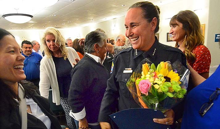 Stephanie Foley leaves the packed City Council Chambers after she was sworn in as Sedona’s first woman police chief on Tuesday, Sept, 13. (VVN/Vyto Starinskas)