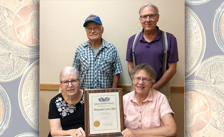 Club members with their ANA plaque honoring their 50 years of membership. Left to right: Bill Deloney, David Eagle, Sandra Wolf and Margie Farthing posing with the plaque.  (Prescott Coin Club/Courtesy)