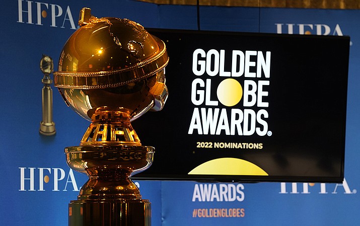 FILE - A Golden Globe statue appears at the nominations event for 79th annual Golden Globe Awards at the Beverly Hilton Hotel on Dec. 13, 2021, in Beverly Hills, Calif. After a year spent off air, the Golden Globe Awards are returning to NBC in January, NBC, the Hollywood Press Association and Dick Clark Productions announced Tuesday , Sept. 20, 2022. (Chris Pizzello, AP File)