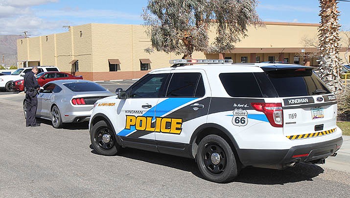 A Kingman police officer makes a traffic stop in this file photo. (Miner file photo)