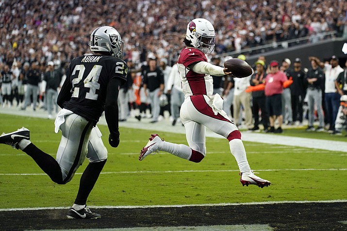 Arizona Cardinals quarterback Kyler Murray runs in for a touchdown as time expires during the fourth quarter of a game against the Las Vegas Raiders Sunday, Sept. 18, 2022, in Las Vegas. (John Locher/AP)