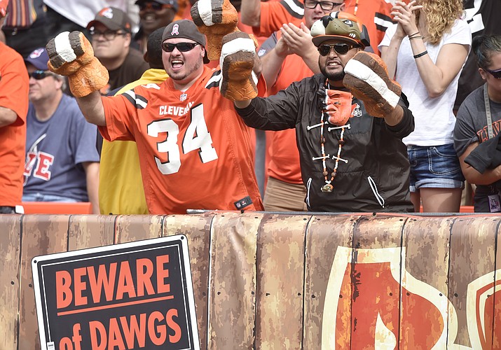 Fans cheer in the Dawg Pound end zone seats during a game between the Cleveland Browns and the New York Jets, Sunday, Oct. 8, 2017, in Cleveland. Nine home teams are underdogs in Week 3. Behind the Dawg Pound, the Cleveland Browns aren’t among them. The Browns host the Pittsburgh Steelers on Thursday night to kick off a week featuring more road favorites than home. (David Richard/AP, File)
