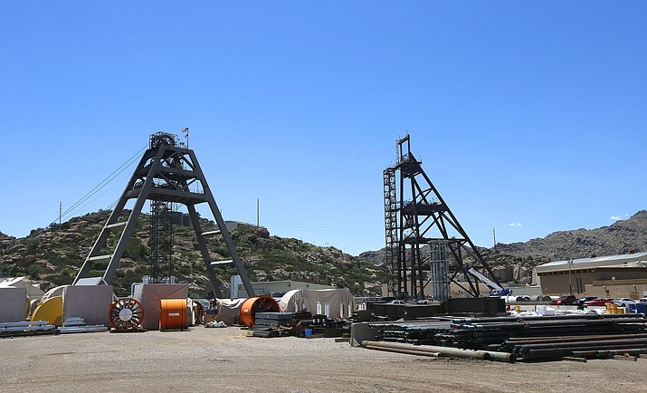 Equipment stands around the Resolution Copper Mining area Shaft #9, right, and Shaft #10, left, that awaits the expansion go ahead in Superior, Ariz., June 15, 2015. A federal agency says an environmental review for a proposed copper mine in Arizona falls short on details about water and the potential impacts of climate change. (Ross D. Franklin/AP, File)