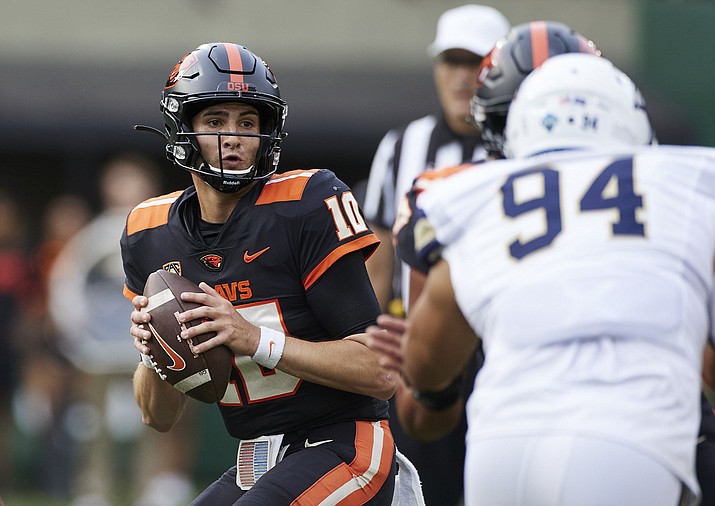 Oregon State quarterback Chance Nolan drops back to pass against Montana State during the first half of a game in Portland, Ore., Saturday, Sept. 17, 2022. (Craig Mitchelldyer/AP)