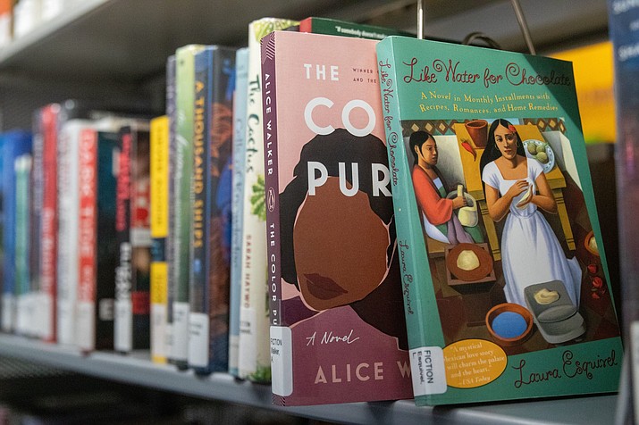 Alice Walker’s “The Color Purple” and Laura Esquivel’s “Like Water for Chocolate” are among the books that could be prohibited under Arizona’s ban on sexually explicit materials in schools. Photo taken Sept. 15, 2022, inside Burton Barr Central Library in Phoenix. (Emily Mai/Cronkite News)