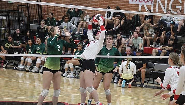 Jade Russell of Lee Williams sets up a teammate in the Lady Volunteers 3-0 win over Mohave in a matinee game played Friday at Lee Williams. The Vols won by set scores of 29-27, 25-10, 25-15 and improved to 4-3 for the season. (Kingman Miner photo)