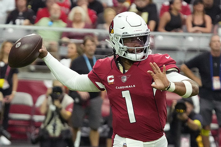 Arizona Cardinals quarterback Kyler Murray (1) throws against the Los Angeles Rams during the first half of an NFL football game, Sunday, Sept. 25, 2022, in Glendale, Ariz. (AP Photo/Rick Scuteri/AP)