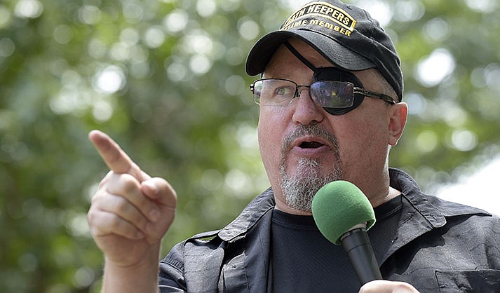 Stewart Rhodes, founder of the citizen militia group known as the Oath Keepers speaks during a rally outside the White House in Washington, on June 25, 2017. Rhodes formally launched the Oath Keepers in Lexington, Massachusetts, on April 19, 2009, where the first shot in the American Revolution was fired. (AP Photo/Susan Walsh, File)