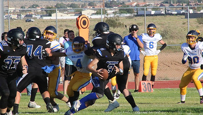 The Kingman Academy Tigers, shown in action earlier this season, beat the Cortez High School Colts Saturday in a high school football game played at Kingman High School. (Miner file photo)