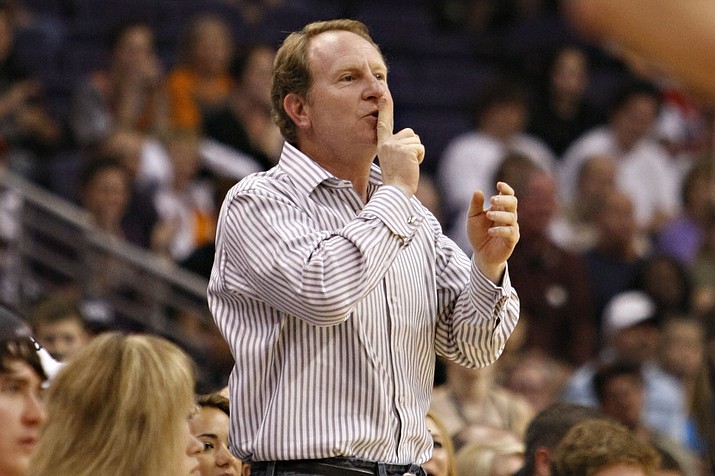 Phoenix Suns owner Robert Sarver gestures to Indiana Pacers' Danny Granger after Granger missed a shot during the second half of a game Saturday, March 6, 2010 in Phoenix. Robert Sarver says he has started the process of selling the Phoenix Suns and Phoenix Mercury, a move that comes only eight days after he was suspended by the NBA over workplace misconduct including racist speech and hostile behavior toward employees. Sarver made the announcement Wednesday, Sept. 21, 2022, saying selling “is the best course of action.” He has owned the teams since 2004. (Matt York/AP, File)