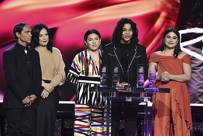 Zahn McClarnon, Sarah Podemski, Paulina Alexis, D'Pharaoh Woon-A-Tai and Devery Jacobs accept the award for best ensemble cast in a new scripted series for "Reservation Dogs" at the 37th Film Independent Spirit Awards March 6, 2022, in Santa Monica, California. (Photo by Jordan Strauss/Invision/AP)