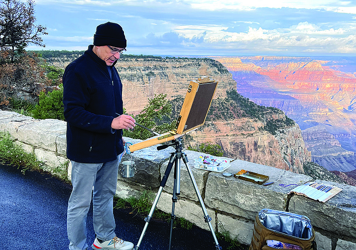 Jose Luis Nunez paints on the Grand Canyon’s South Rim during the Grand Canyon Conservancy’s Celebration of Art Sept. 2-17. (Evelin Mercedes/WGCN)