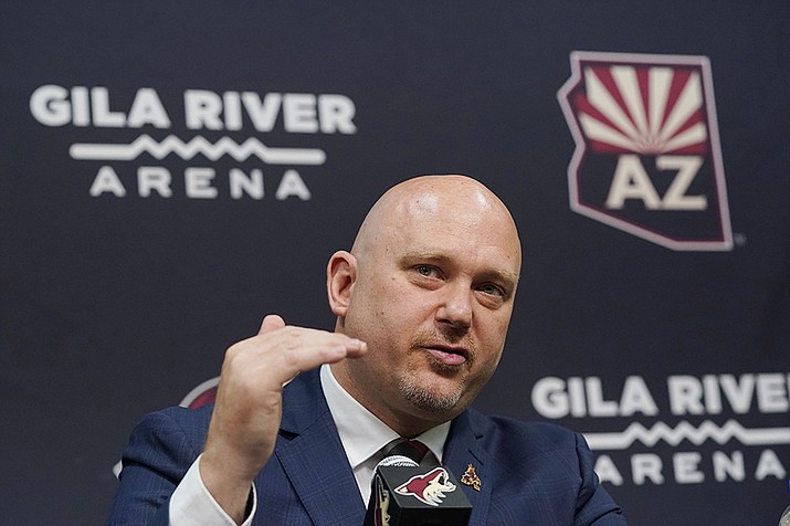 In this July 1, 2021, file photo, Arizona Coyotes head coach Andre Tourigny speaks during an NHL hockey news conference at Gila River Arena in Glendale, Ariz. The Coyotes are in their second year of rebuilding under Tourigny after finishing with the NHL’s second-worst record a year ago. (Ross D. Franklin, AP File)