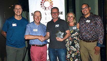 The Sedona Village Partnership honored local restaurateurs John and Nikki Ramagli with their annual Shining Star Award for meritorious service to the community. Pictured: Awards Committee Chair Ben Thurston; SVP President Don Groves; John and Nikki Ramagli and SVP Director Omar Kenney. (Photo courtesy of Jack Ross)