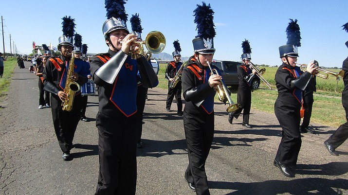 Members of the Chino Valley Marching Band perform during the Territorial Days Parade. The trumpet players are Ezekial Spann, Ronin Deubler and Ashley Artaz-Arnold. The tenor saxophone player is Xander Hogan, and the trombone player is Jacob Spann. (Stan Bindell/For the Review)