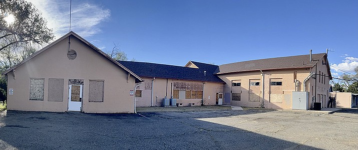 Yavapai County is going back out for bids for a 3.5-acre parcel of property on South Marina Street. The building has served a number of uses over the years, including as the former Jefferson Elementary School, which was built in 1923 and closed in 1938, as well as a community hospital and county departmental offices. On Wednesday, Oct. 5, 2022, the Yavapai County Board of Supervisors voted to issue an invitation for bids after a previous contract for sale failed to close escrow. (Cindy Barks/Courier)