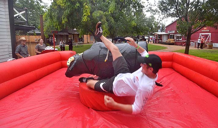 A bull-riding contest on Saturday at Blazin’ M Ranch is for everyone, with the competition judged in four age brackets. (VVN/file/Vyto Starinskas)