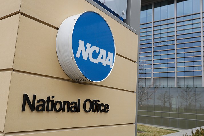 Signage at the headquarters of the NCAA is viewed in Indianapolis, March 12, 2020. (Michael Conroy/AP, File)