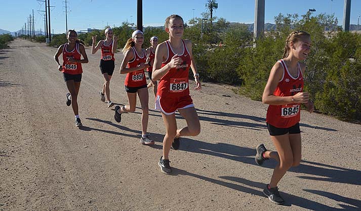Mingus girls’ cross country team warms up in Pecos Park in south Phoenix. (VVN/Raquel Hendrickson)