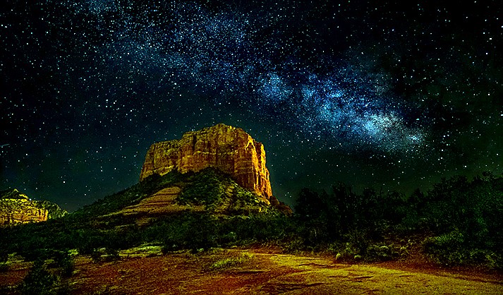 Monumental - The Milky Way is poised above Courthouse Butte in this star-scape image. (Courtesy/Bob Coates)