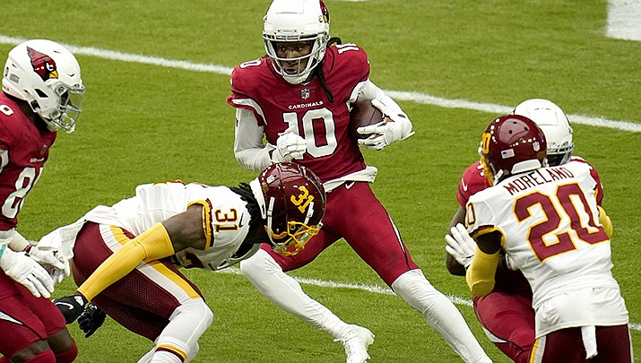 Colt McCoy, subbing for Kyler Murray, passed for 238 yards and DeAndre Hopkins, pictured here, had 10 catches to lead the Arizona Cardinals to a 37-27 win over the Los Angeles Rams on Sunday. (AP file photo)