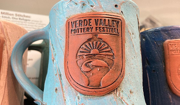 The first 50 visitors to the festival receive a free mug. (VVN/Paige Daniels)