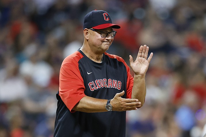 Cleveland Guardians manager Terry Francona makes a pitching change during the fifth inning of the team's baseball game against the Houston Astros, Aug. 4, 2022, in Cleveland. Francona was voted the American League Manager of the Year on Tuesday night, Nov. 15, winning the award for the third time in 10 seasons after leading the Guardians to the AL Central title. Francona received 17 of 30 first-place votes and nine second-place votes for 112 points from a Baseball Writers’ Association of America panel. (Ron Schwane/AP, File)