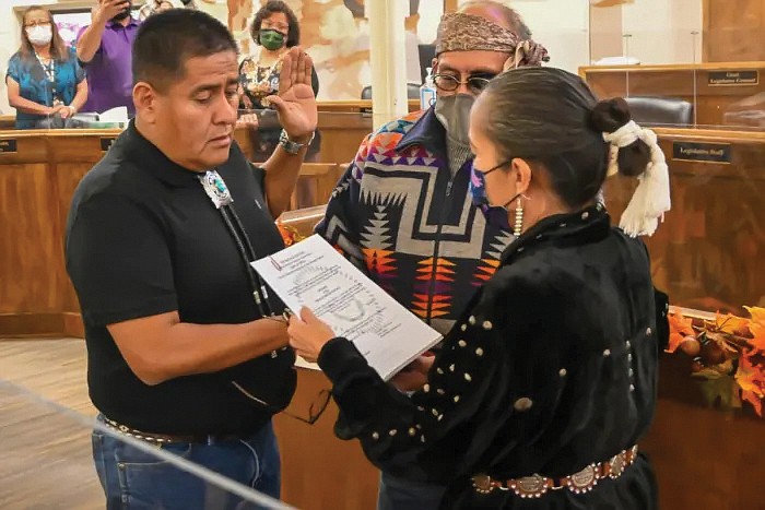 Madam Chief Justice JoAnn Jayne administers the Oath of Office to Speaker Otto Tso with Hon. Eugene Tso as the witness at the Navajo Nation Council Chamber in Window Rock, AZ. (Photo/Navajo Nation Council)